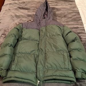 Like new perfect condition hooded puffer jacket. Worn once.